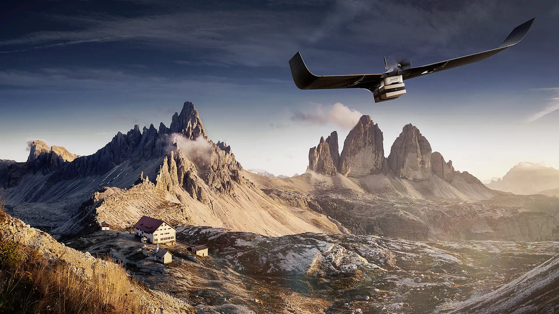 Lehmann flying-wing aircraft in flight over high-altitude terrain